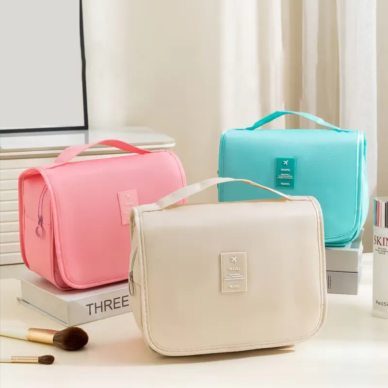 Fabric travel cosmetic bag manufacturer - Assorted colors cosmetic bag with hangable hook and handle for custom OEM production