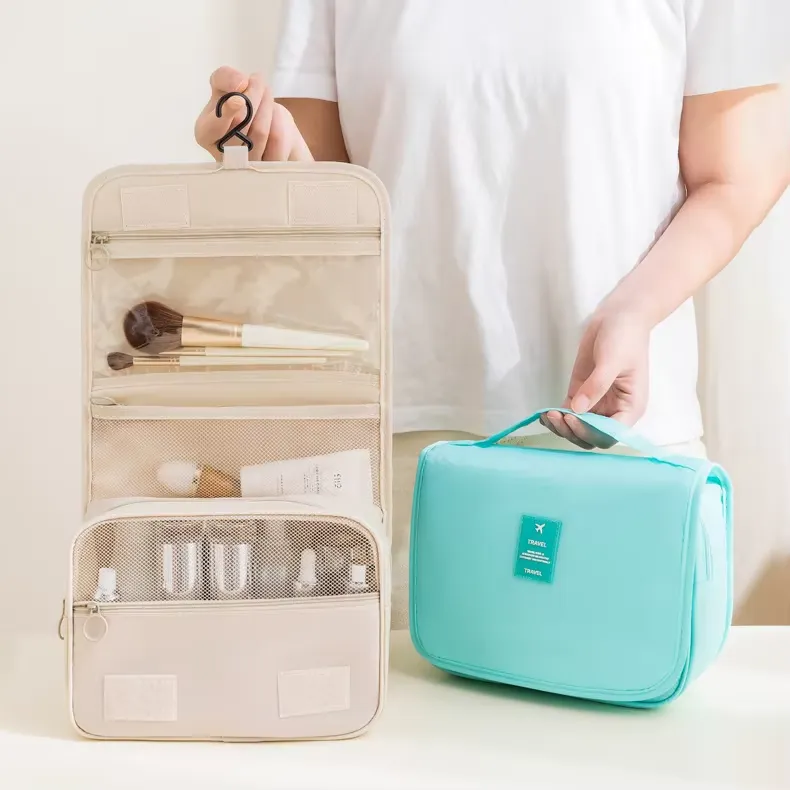 Hangable design detail - Fabric bag with hook and multiple compartments for wholesale beauty accessory production