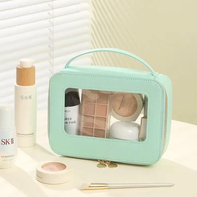 PU cosmetic bag manufacturer - Assorted colors makeup bags with transparent windows and handles for custom OEM production