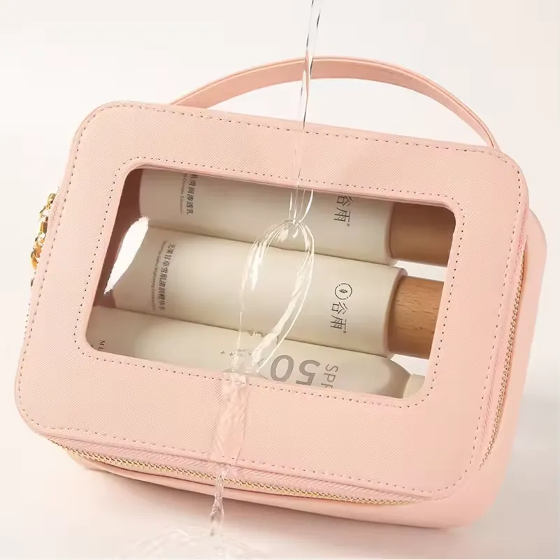 Pink PU cosmetic bag - Clear window detail showing content visibility for wholesale beauty accessory production