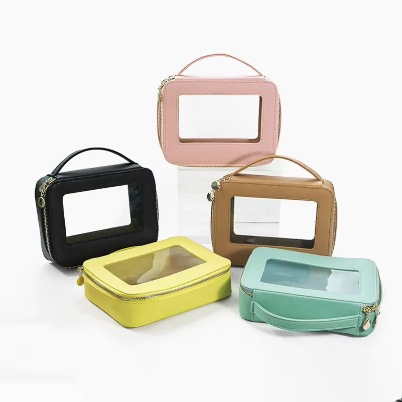 PVC cosmetic bag manufacturer - Assorted colors makeup bags with transparent windows and handles for custom OEM production