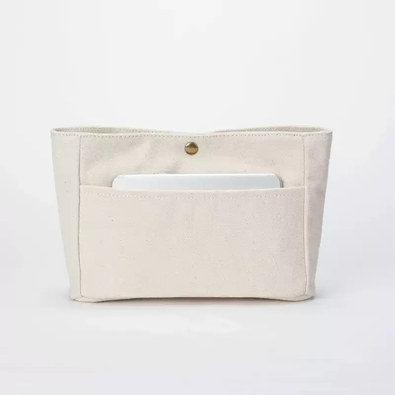 Exterior pocket detail - Front pocket functionality for wholesale beauty accessory production