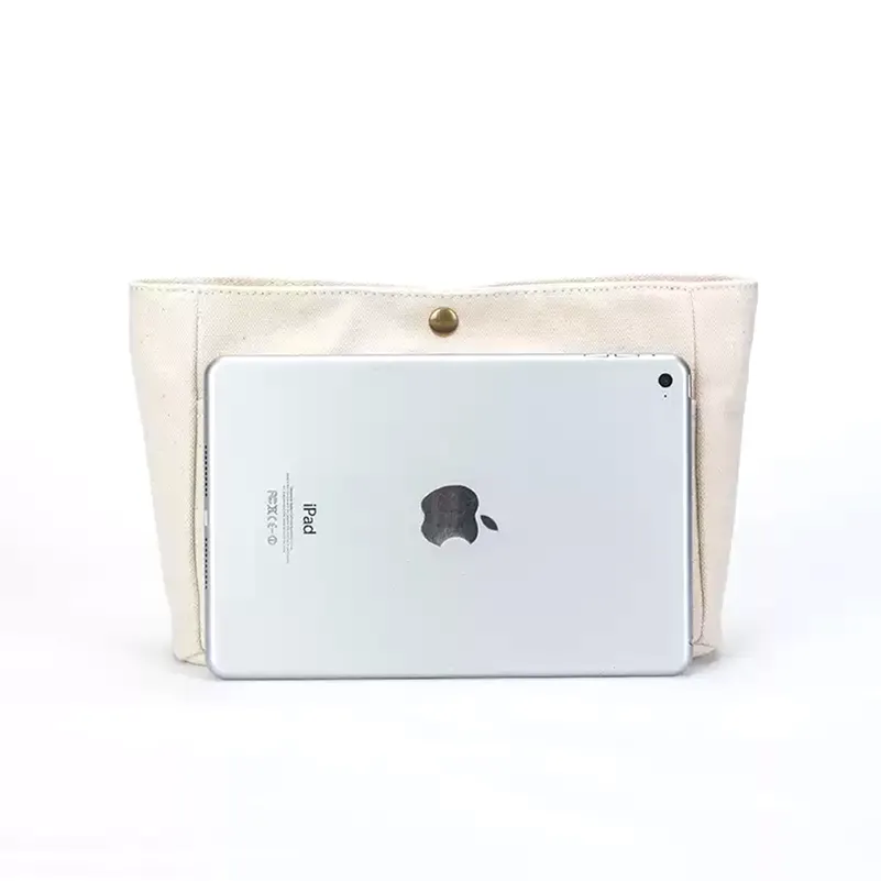 Tablet storage demonstration - Canvas bag capacity for tech devices custom manufacturing