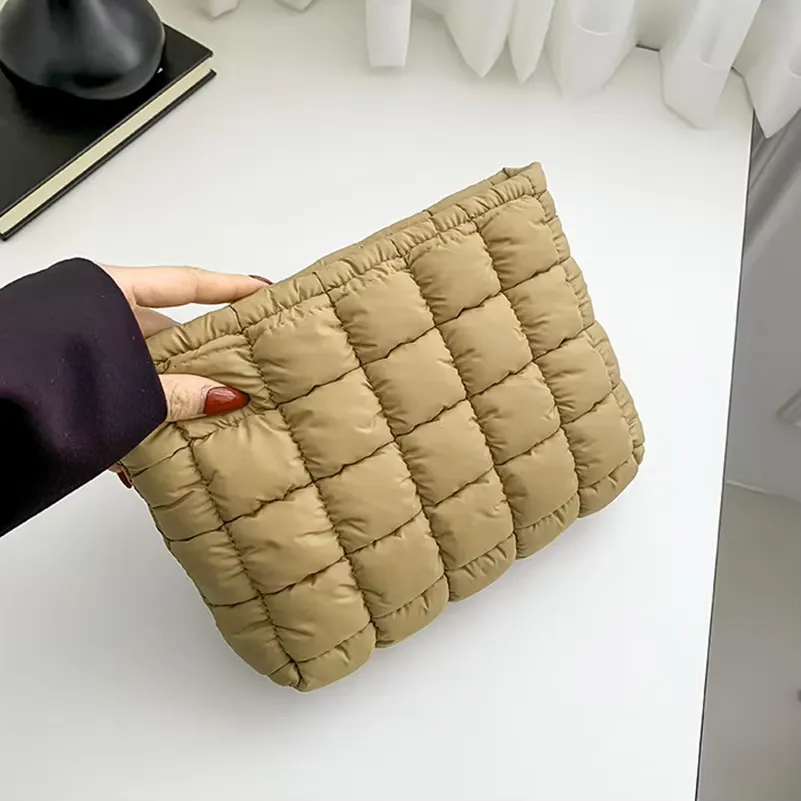 Quilted cosmetic bag manufacturer - Beige diamond quilted makeup bag with structured design for custom OEM production