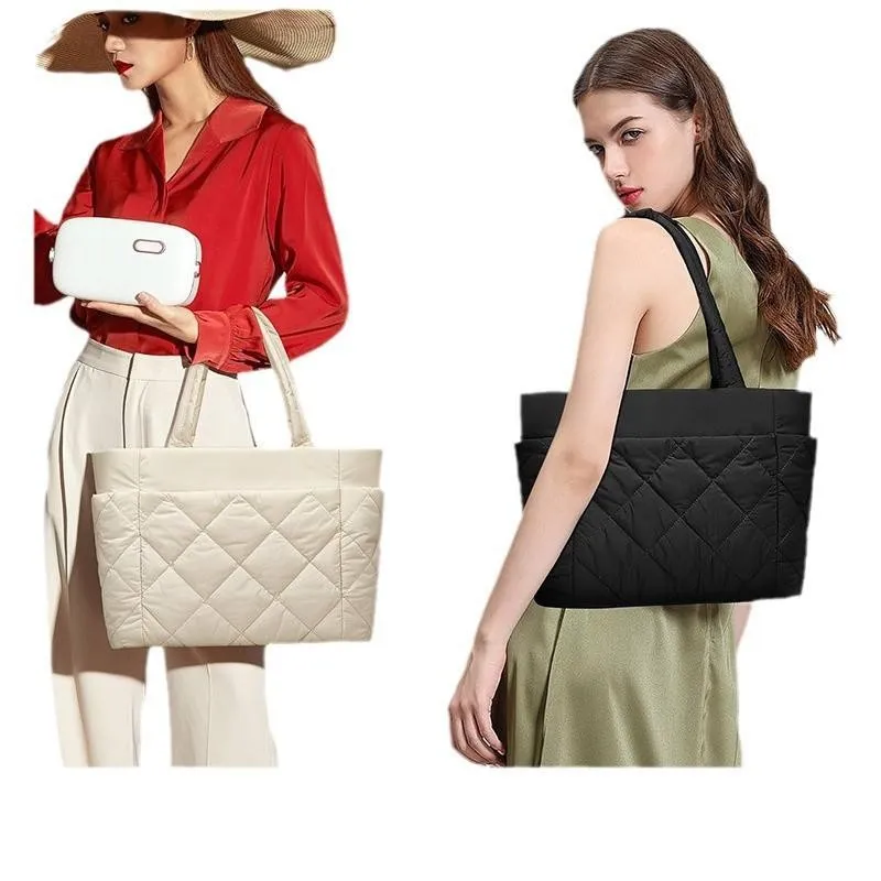 Custom nylon tote bag manufacturer - Front view of grey waterproof nylon tote with black straps