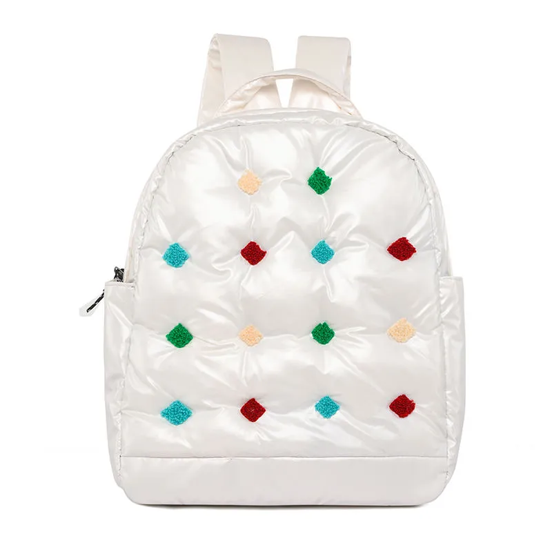 White quilted nylon backpack with clean glossy finish - elegant fashion accessory