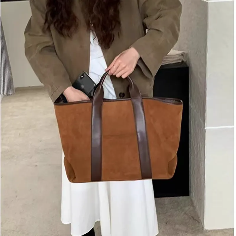 Suede tote bag lifestyle - Minimalist design for wholesale luxury accessory production