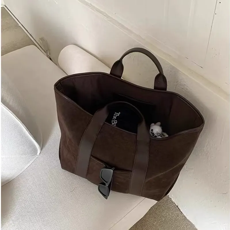 Suede tote interior detail - Premium construction for wholesale distribution