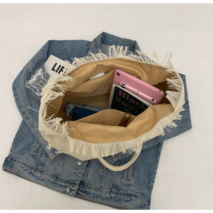 Canvas tote interior view - Custom manufacturing quality for wholesale fashion accessories showing construction detail