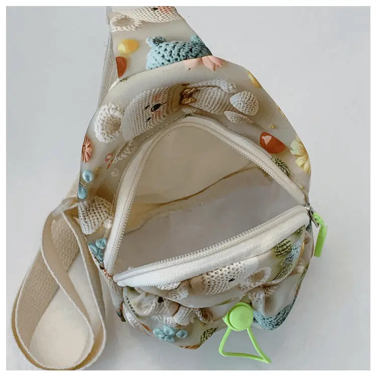 Kids waist bag interior view - Manufacturing capacity for OEM orders showing compartment options