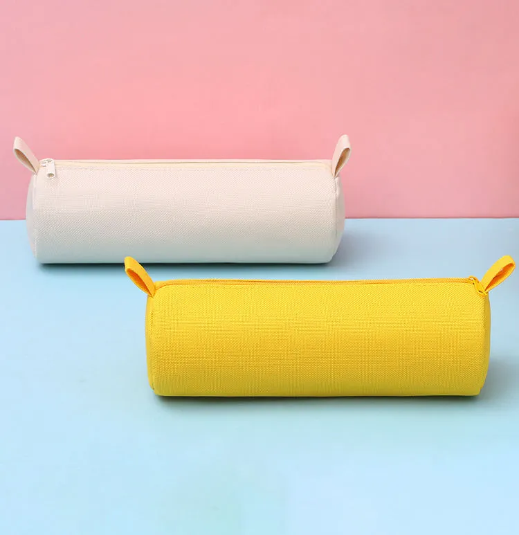 Cylindrical Oxford cloth cosmetic bag manufacturer - Beige and yellow tube makeup bags with fabric tab pulls for custom OEM production