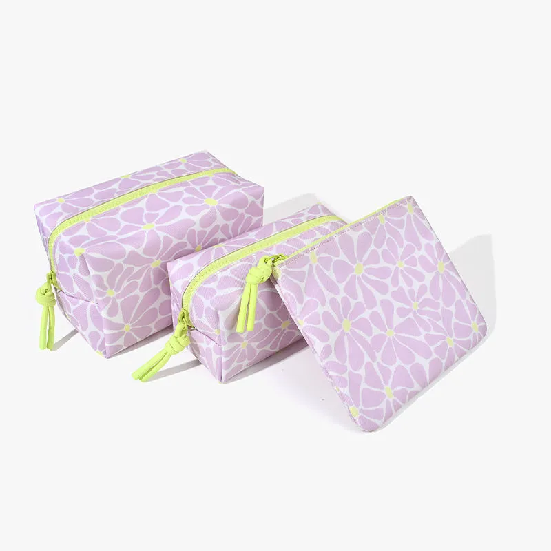 Canvas bag set detail - Knotted zipper pulls and coordinated design for wholesale beauty accessory production