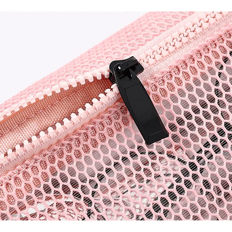 Mesh waist bag zipper detail - Manufacturing capacity for OEM orders showing quality closure system