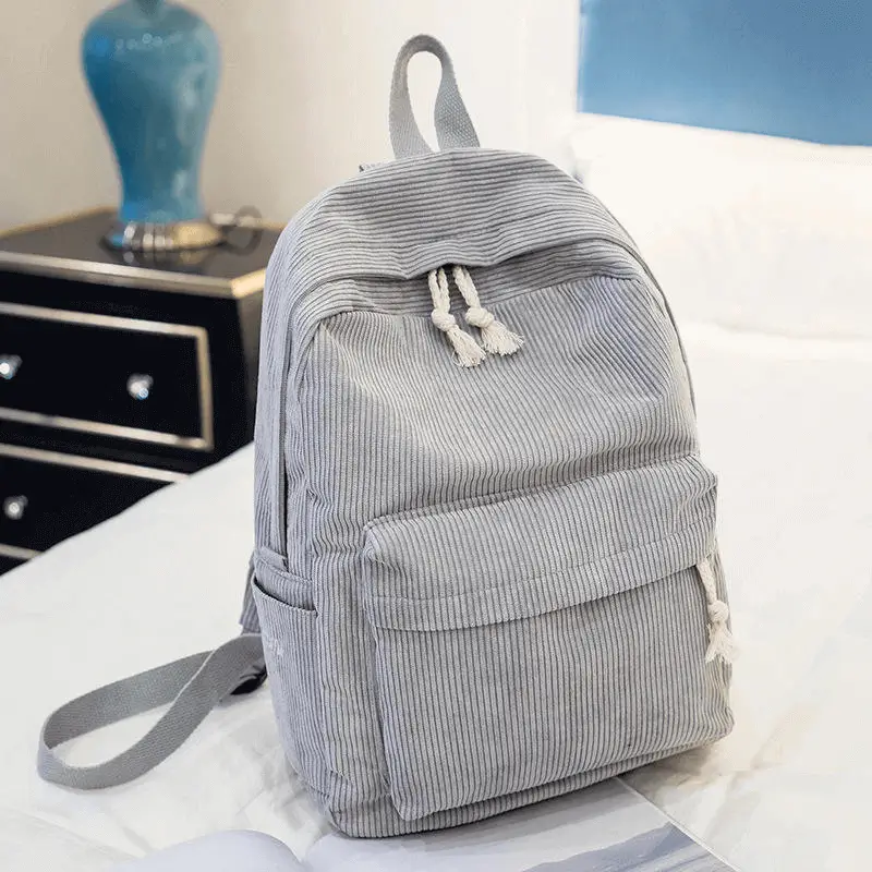 Lifestyle view in bedroom setting - fashion backpack manufacturer