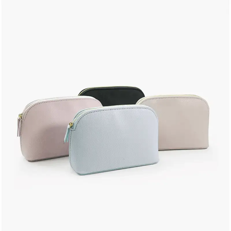 Shell shape cosmetic bag side view - Curved design for custom manufacturing