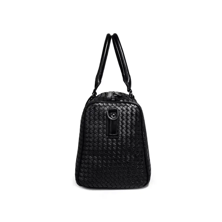 Structured silhouette detail - Premium duffel bag factory showing fine construction and metal hardware for wholesale travel orders