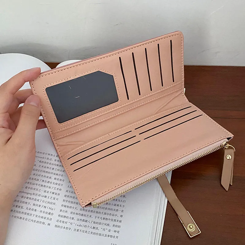 Contrast interior detail - Blush pink lining with multi-card slots and zippered coin pocket