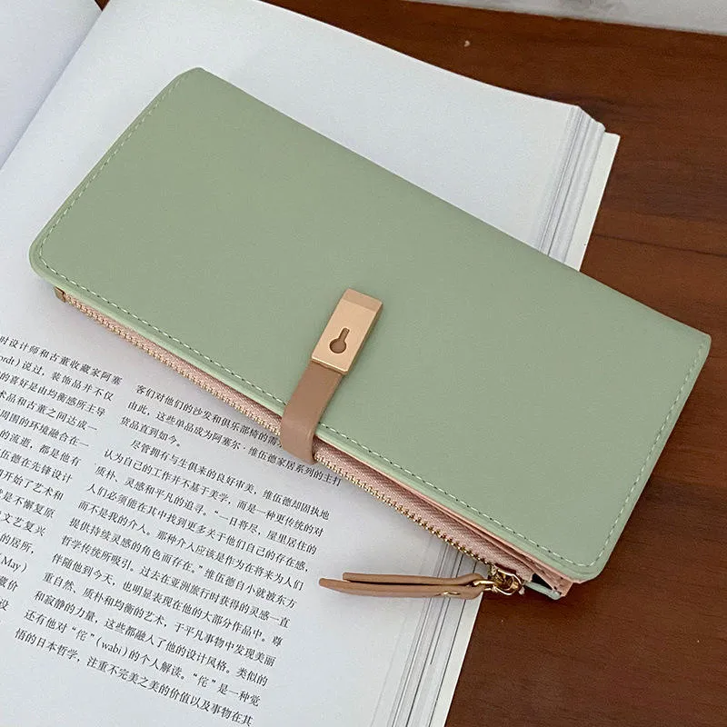 Compact side profile of PU ladies wallet showing dual-closure security and slim design