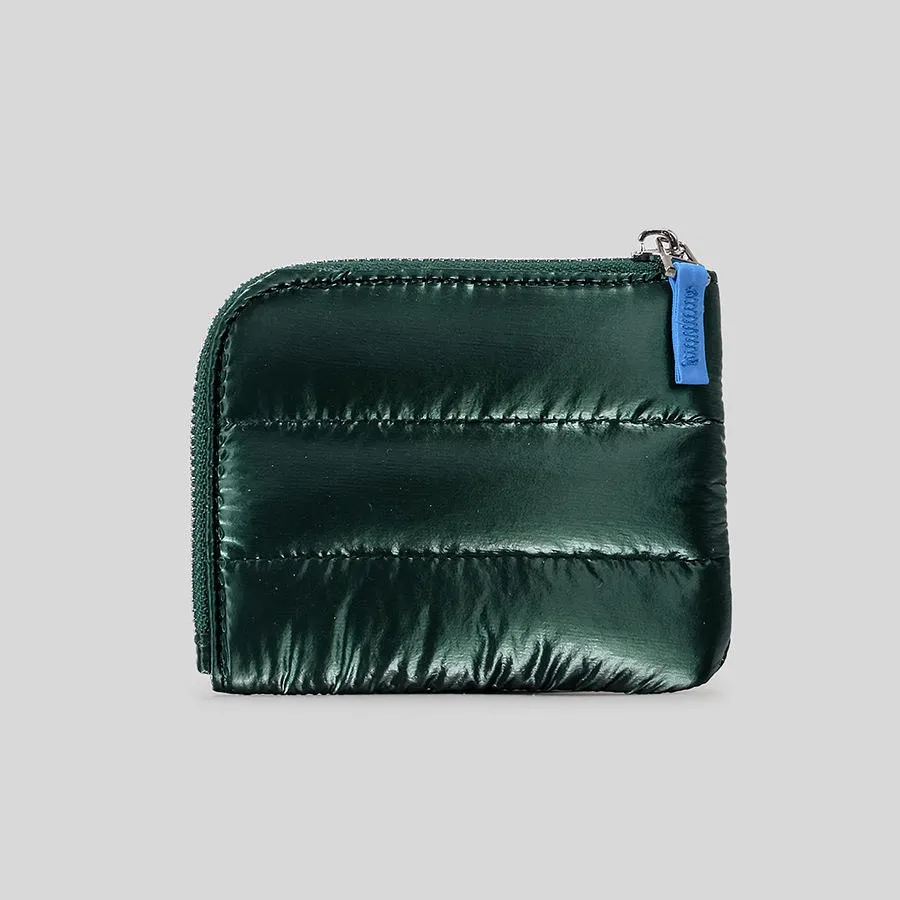 Detail of horizontal quilted stitching on metallic pink fashion purse