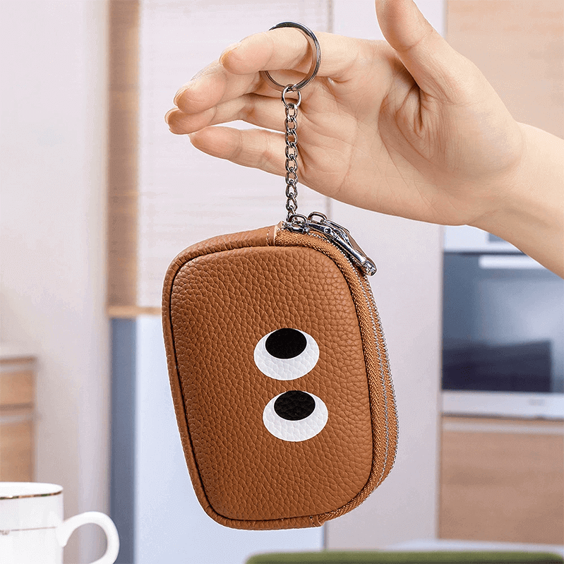 Brown Eye-Print Wallet Hand-held View - OEM manufacturer size and keychain demonstration