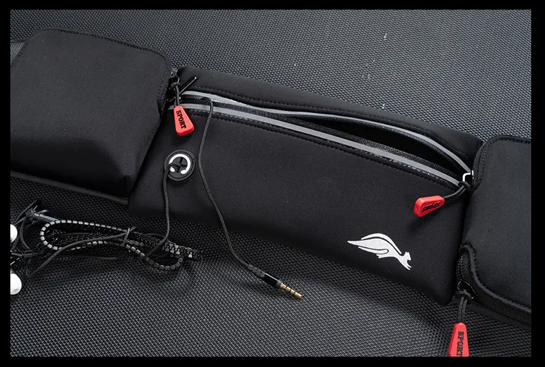 Three independent zip pockets on custom marathon waist belt