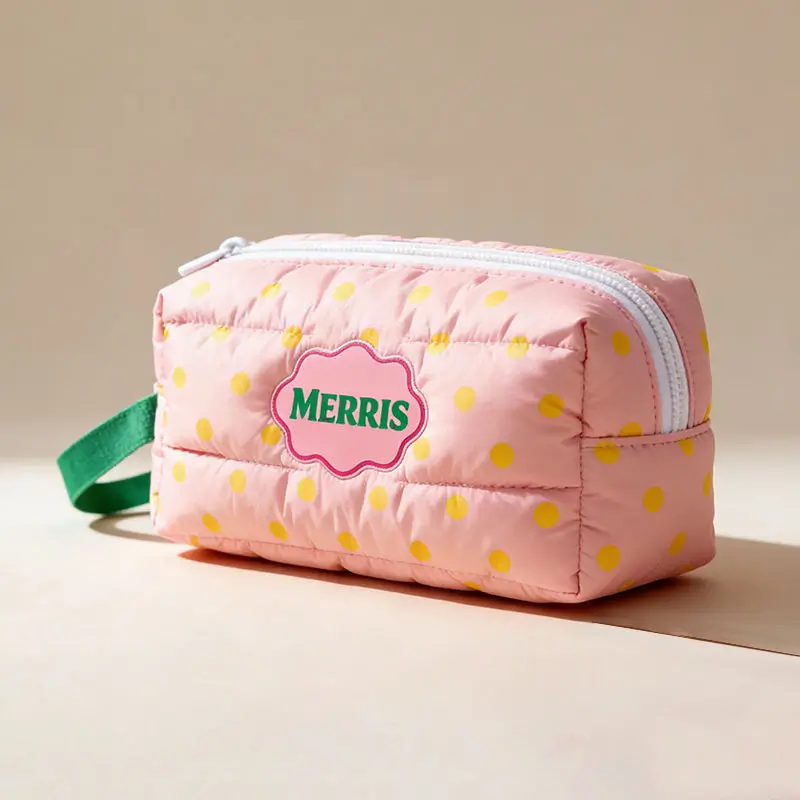 PU cosmetic bag manufacturer - Quilted wristlet makeup bag with playful polka dot pattern for custom OEM production