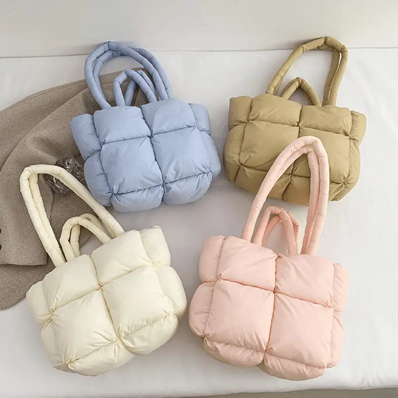 Puff tote interior view - Custom manufacturing quality for wholesale fashion accessories showing secure closure systems