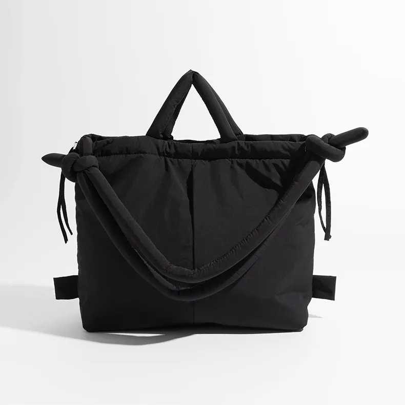 Nylon tote bag manufacturer - Puffy black nylon tote with knot details for custom OEM production
