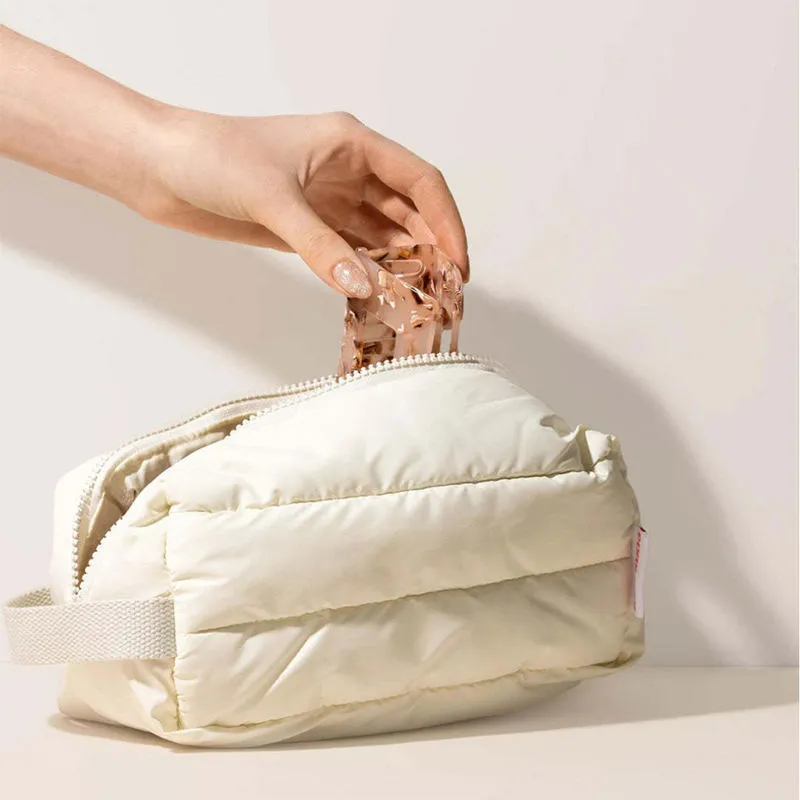 Beige puffy nylon travel bag - Neutral travel color for custom manufacturing