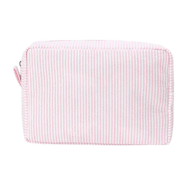 Vibrant striped cosmetic bag stitching detail - Construction precision for wholesale distribution