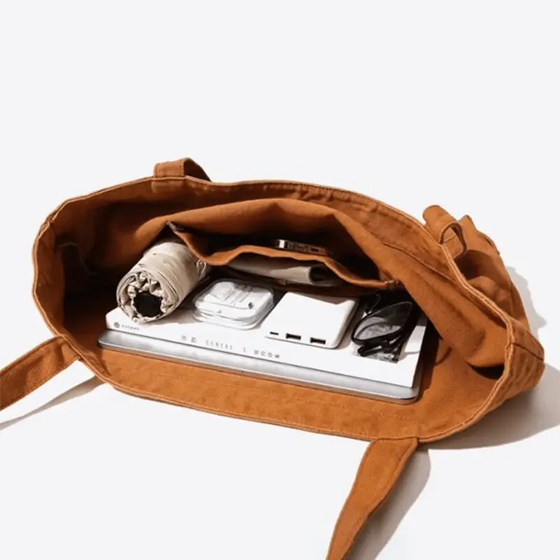 Canvas shoulder bag interior view - Custom manufacturing quality for wholesale accessories showing organized compartments