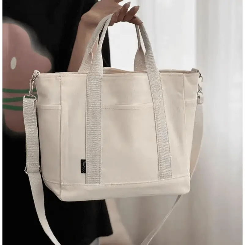 Canvas tote bag interior view - Custom manufacturing quality for wholesale accessories showing organized compartments