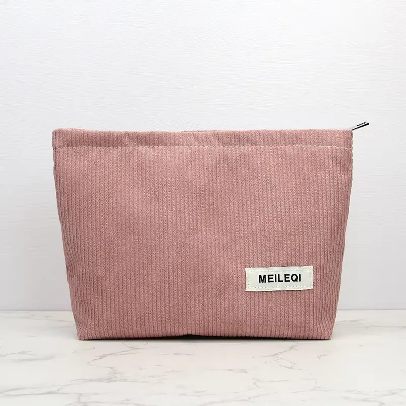 Soft pink corduroy cosmetic bag manufacturer - Velvety structured makeup bag with brand label for custom OEM production