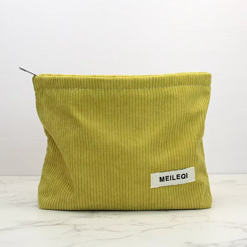 Yellow corduroy makeup bag - Color variation quality for custom manufacturing