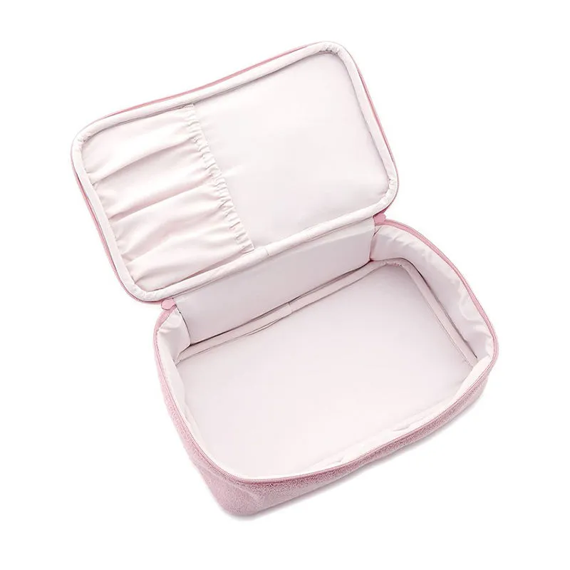 Soft towel fabric embroidered cosmetic bag detail view - Embroidery quality for wholesale beauty accessory production