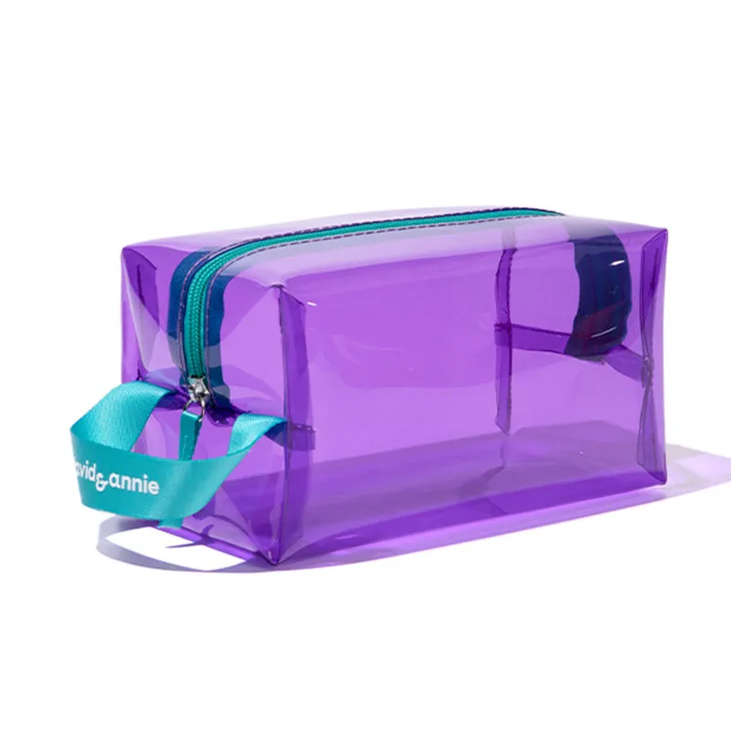 Vibrant purple PVC cosmetic bag - Custom branding on wrist strap for OEM orders